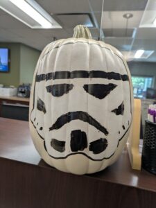 white pumpkin painted like a Stormtrooper from Star Wars